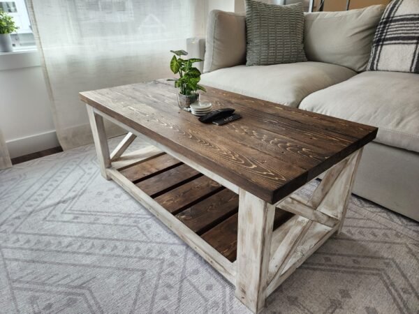 Farmstyle coffee table with beige couch and plant on top
